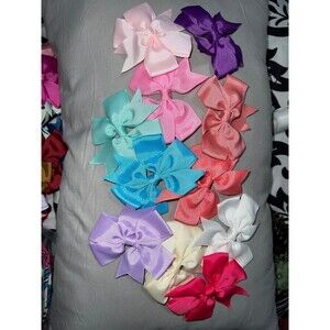 Hair Bows for girls a large mix of colors and shades hair ties bows 41 and a hat